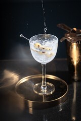 martini cocktail with olives