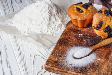 muffins baked with the addition of ammonium carbonate on a wooden rustic background