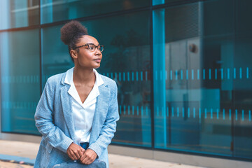 businesswoman  with digital tablet waiting near business centre  business partner concept