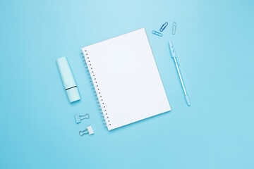 Creative flat lay mockup design of workspace. Top view composition with white notebook, to do list...
