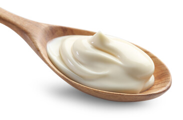 Natural yogurt in wooden spoon isolated on white
