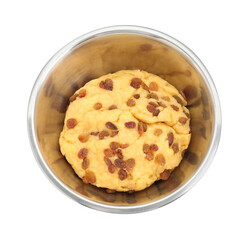 Dough with raisins in bowl isolated on white, above view