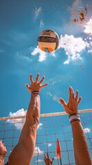 Close-up of hands spiking a volleyball, capturing the tension and athleticism of a beach volleyball game
