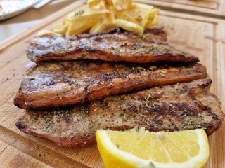 ribs meat and french fries lemon greek food