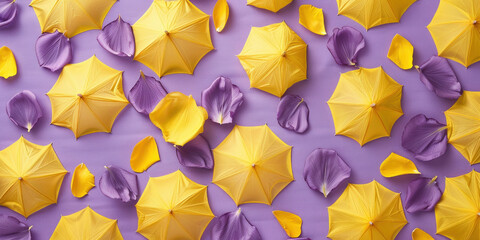 Colorful umbrellas and flower petals on a vibrant purple and yellow background for a summer concept - obrazy, fototapety, plakaty