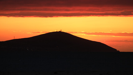 Bozcaada sunset in Aegean Island
from Geyikli neighborhood at &Ccedil;anakkale city. Golden hours with sea and island at Bozcaada.