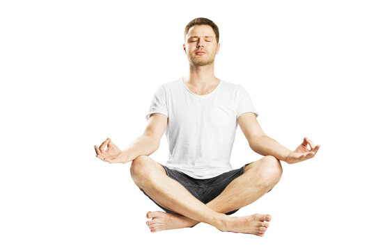 A man in a white t-shirt and black shorts meditating, isolated on a white background, illustrating peace and mindfulness
