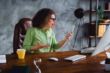 Photo of aggressive mad woman loud shouting failure conflict bad mood workspace workstation