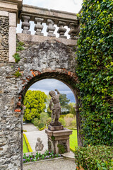 entrance to the Borromean botanical gardens of Isola Bella on Lake Maggiore with a view of an...