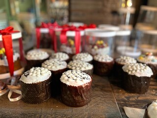 Orthodox Easter with Easter cake decorated with White fondant with a figure of a bunny and chickens on the table