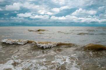 Cloudy sky over stormy sea
