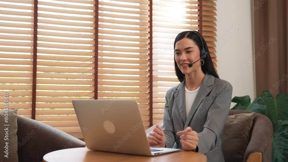 Aufkleber female call center operator or customer service helpdesk staff working on workspace while talking on