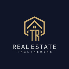 initial monogram logo for real estate with building shape creative design	
