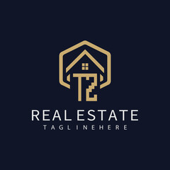 initial monogram logo for real estate with building shape creative design	
