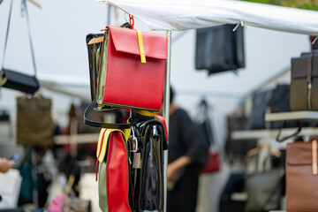 Leather purses sold on annual Nations Fair, where masters from the national communities of...