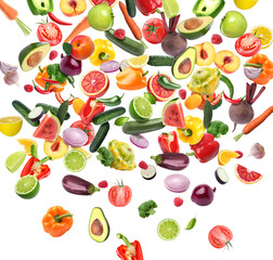 Different fresh fruits and vegetables in air on white background