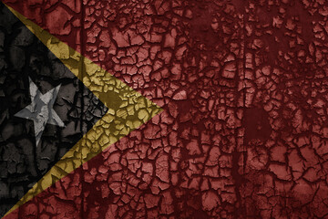 flag of east timor on a old grunge metal rusty cracked wall background
