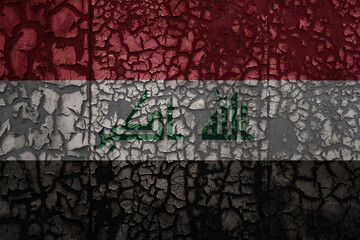 flag of iraq on a old grunge metal rusty cracked wall background