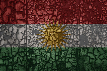 flag of kurdistan on a old grunge metal rusty cracked wall background