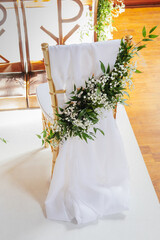 Wedding decorations in a Catholic church. Wedding decorations