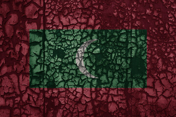 flag of maldives on a old grunge metal rusty cracked wall background