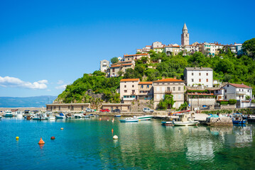 vrbnik, croatia, 29 april 2028, view
from a bay to the old town on the coast