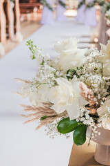 Wedding decorations in a Catholic church. Wedding decorations