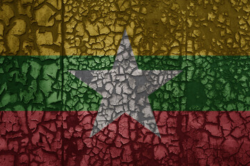 flag of myanmar on a old grunge metal rusty cracked wall background