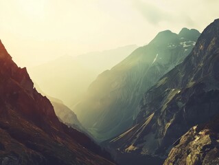 Majestic Mountain Landscape with Ethereal Fog Enshrouding Rugged Cliffs and Valleys