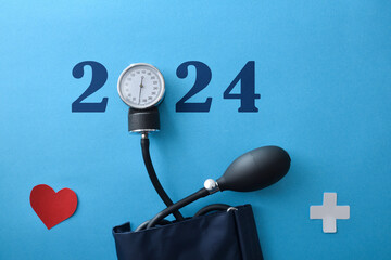 World hypertension day with tensiometer on blue background