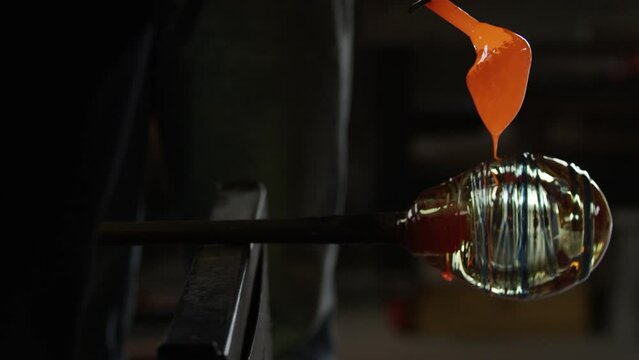 Molten glass is poured over a mold