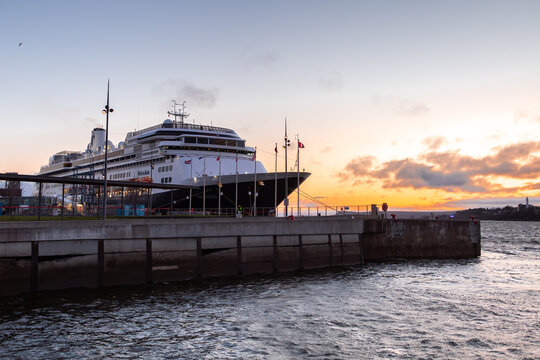 Quebec City, Quebec, Canada, April 29, 2024 - The Holland of America Line Volendam cruise ship moored in the St. Lawrence River old port seen at sunrise