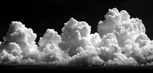 Dramatic fluffy white clouds on a black sky - Powered by Adobe