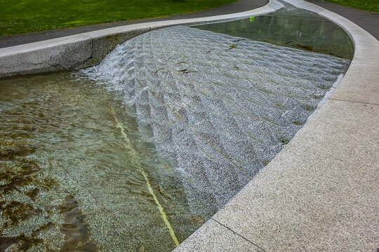 Diana Memorial Fountain is located south of the Serpentine Lake (designed by Gustafson Porte, 2004). London, UK. April 19, 2024.