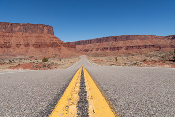 Utah Highway 128 with Red Cliffs and buttes of Castle Valley Area in spring 