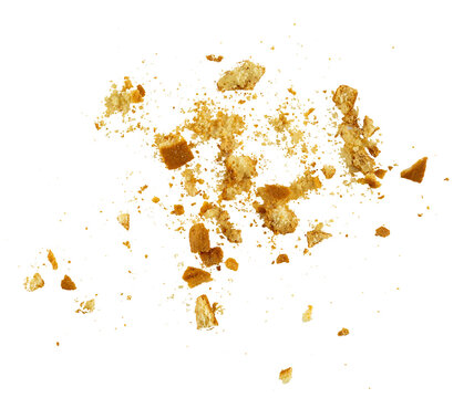 The pile of cake crumbs, cookies flying, grunge graphic overlay element isolated on a transparent background