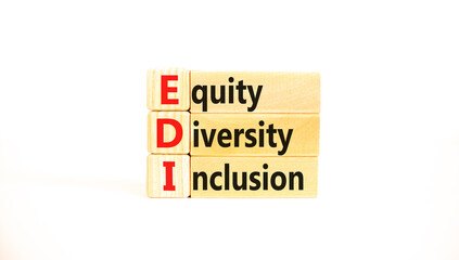 EDI equity diversity inclusion symbol. Concept words EDI equity diversity inclusion on wooden...