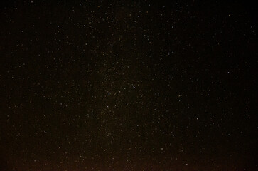 Night sky with stars and constellations. The Milky way.