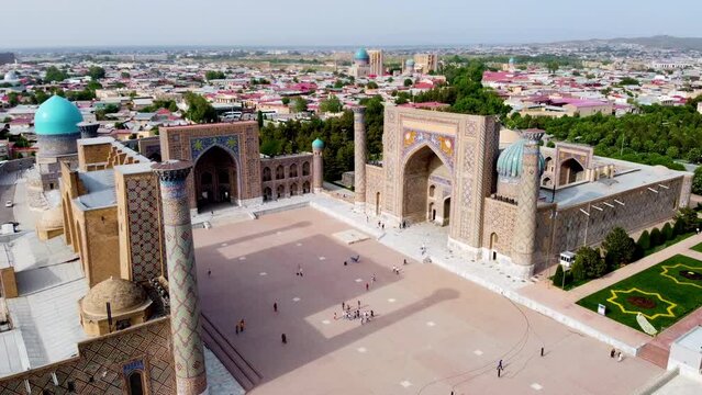 Aerial view of The Registan Square. Ulugh Beg Madrasah ,  Tilya-Kori Madrasah a popular tourist destination of Central Asia. Samarkand, Uzbekistan