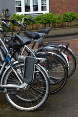 Closeup of bicycle wheels in Amsterdam, Netherlands.