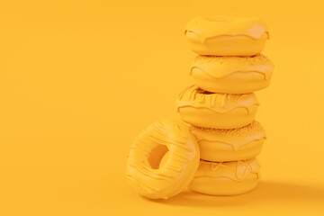 Stack of glazed donut with sprinkles on plain monochrome yellow color