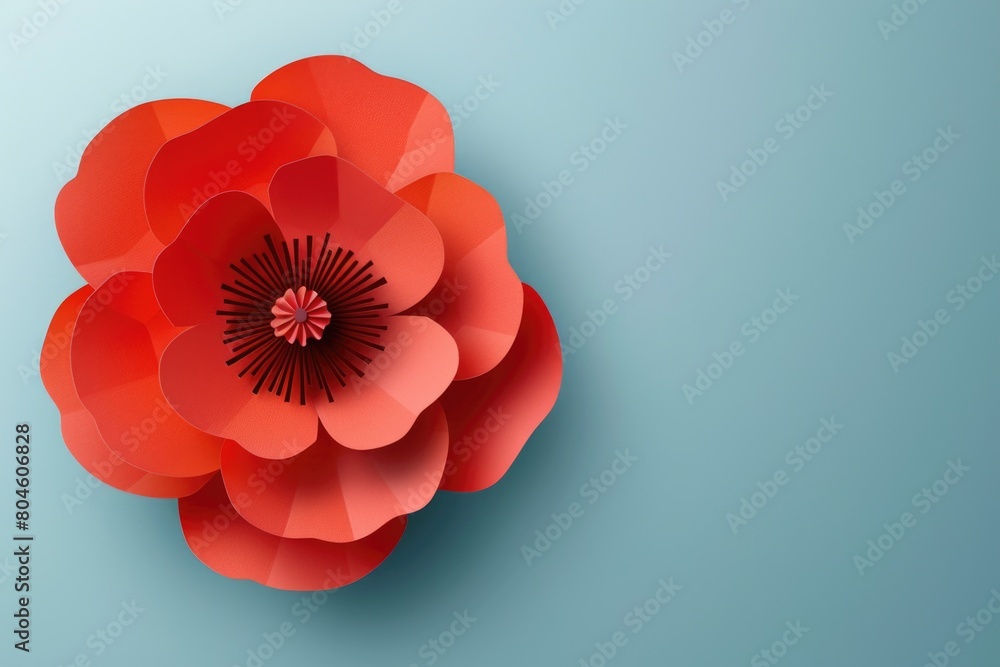 Poster vibrant red paper flower on a calming blue background. perfect for various design projects