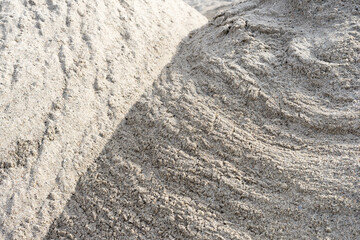 Structures in sand, sand as building material, sand as raw material