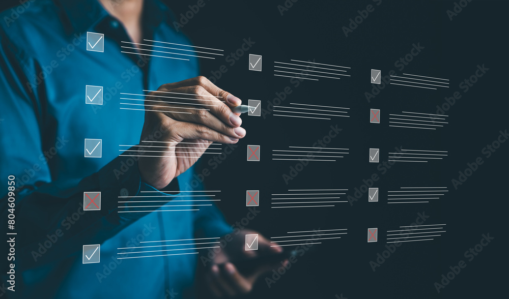 Poster businessman ticking the correct sign in a checkbox on quality control document to approve the projec
