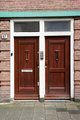 Fototapeta na wymiar Entrance door of a typical Dutch house. Amsterdam housing concept.