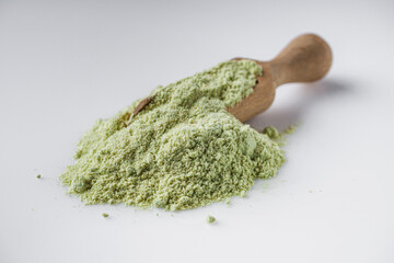 Fragrant wasabi powder on a white background
