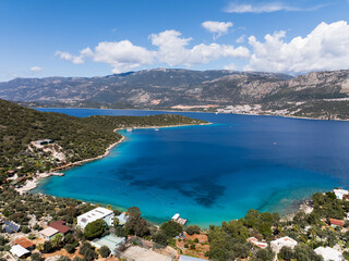 A captivating aerial view of Limanagzi Bay and Kas town in Antalya, Turkey, showcasing the deep...