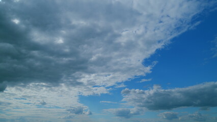 Majestic amazing sky with Summer clouds. Nature weather blue sky. Time lapse.