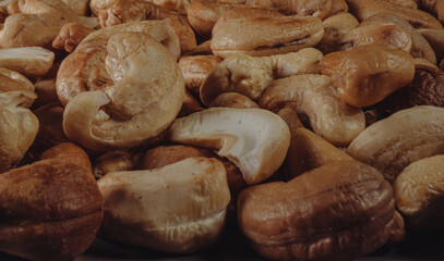 Roasted cashew nuts close up.