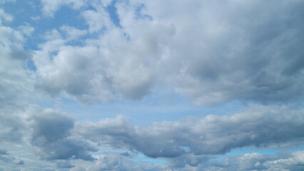 Summer blue sky and white clouds background. Layers of cloud space. Blue sky fluffy white clouds on...